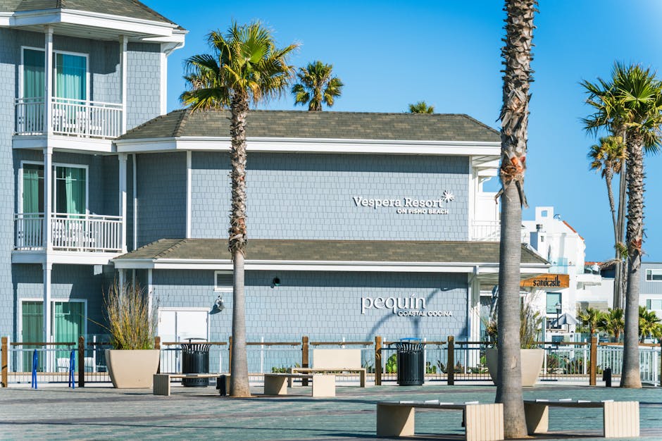 Vespera Resort in Pismo Beach offers stunning coastal views with modern architecture and palm trees.